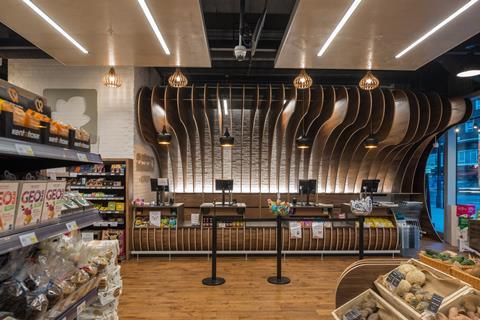The store uses a wooden material palette to underscore the organic emphasis of its proposition